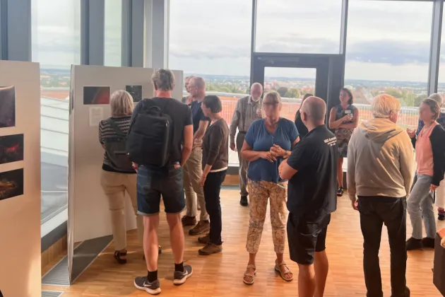 Mingling at the vernissage. Photo. 