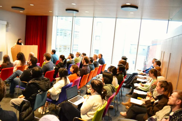 Audience listening to a lecture 